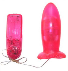 Żelowy penis analny z przyssawką, koloru różowego, o grubości 4,2 cm i długości 12 cm. Z wibratorem.